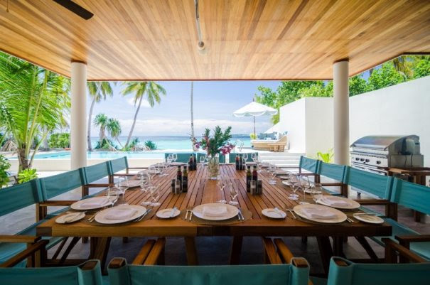 The Great 8 Bedroom Residence outdoor dining area. Amilla Fushi, Baa Atoll, Maldives.