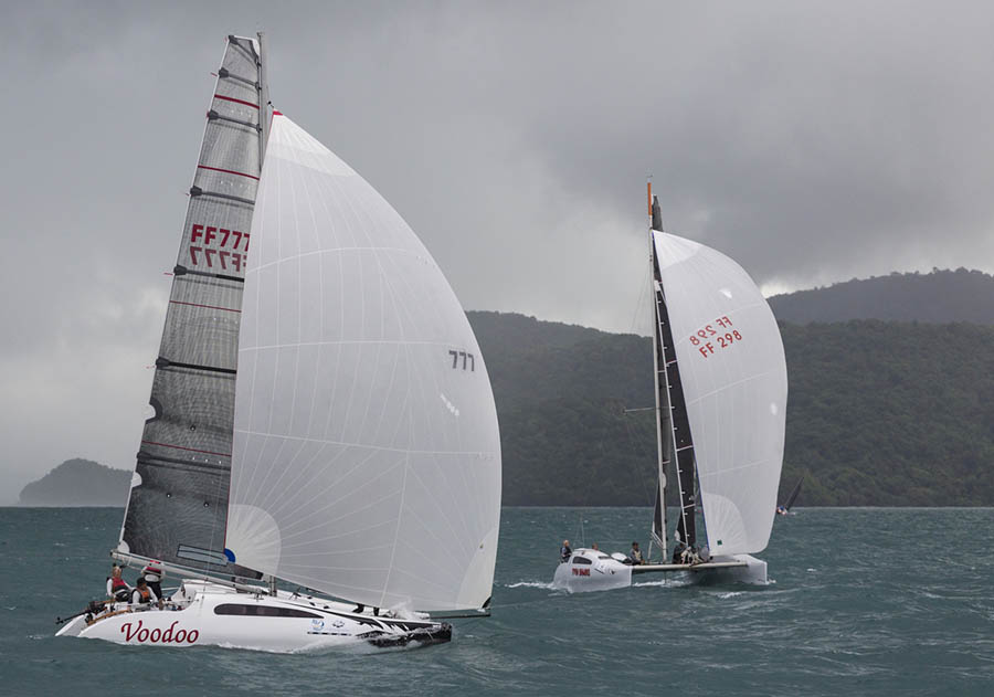 Close battle between Voodoo and Twin Sharks in the Firefly class. Day 2, Cape Panwa Hotel Phuket Raceweek 2019.